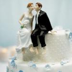 Whimsical Sitting Bride and Groom Cake Topper Caucasian image